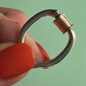 Marla Aaron sterling silver and 14k rose gold trundle lock ring. Size 8